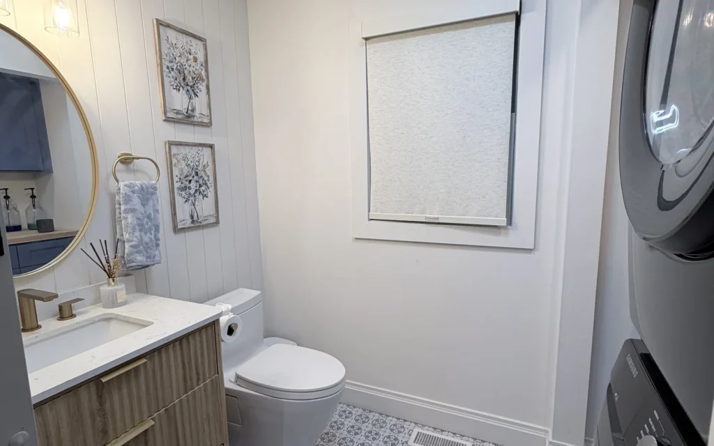 Completed Half Bathroom & Laundry Room Remodel by Reliance Construction